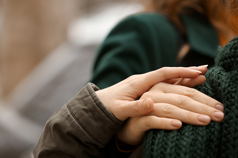 Two hands holding